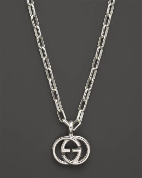 small gucci gold charm|Gucci silver and onyx necklace.